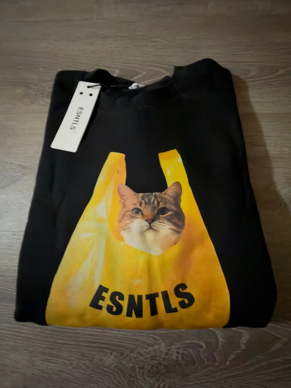 ESNTLS Black Sweatshirt with Yellow Cat Bag Graphic